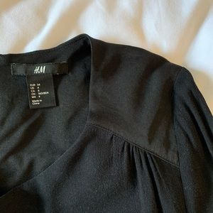 Sleek Black Mini Dress with 3/4 Sleeves